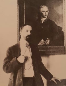 Фото. И.Я.Билибин у портрета прадеда Я.И.Билибина кисти Д.Г.Левицкого. Фото начала 1900-ых.